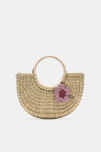 Borsa a cesto in rafia decorata
