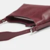 Borsa a tracolla con impunture Borsa a tracolla con impunture