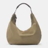 Borsa shopper con anelli borchiati