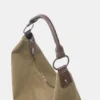 Borsa shopper con anelli borchiati