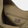 Borsa shopper con anelli borchiati