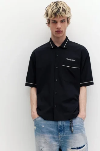 Camicie a maniche corte ricamate