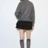 Cardigan con zip Cardigan con zip