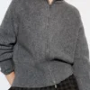 Cardigan con zip Cardigan con zip