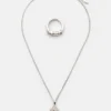 Confezione con collana e anello con pietra