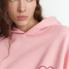 Felpa con cappuccio con grafica a forma di cuore