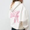 Felpa con cappuccio e grafica a fiocco Felpa con cappuccio e grafica a fiocco