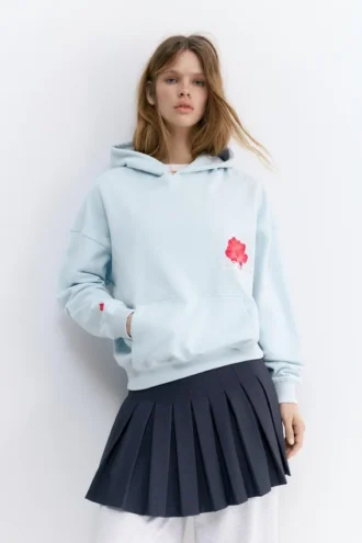 Felpa con cappuccio e grafica floreale