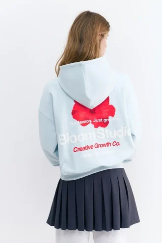 Felpa con cappuccio e grafica floreale