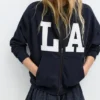 Felpa con cappuccio e zip con grafica Felpa con cappuccio e zip con grafica