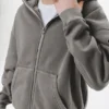 Felpa con cappuccio e zip dal taglio ampio e effetto lavato Felpa con cappuccio e zip dal taglio ampio e effetto lavato