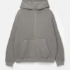 Felpa con cappuccio e zip dal taglio ampio e effetto lavato Felpa con cappuccio e zip dal taglio ampio e effetto lavato