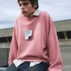 Felpa con etichetta rosa Felpa con etichetta rosa