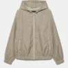 Impermeabile leggero a quadri con cappuccio Impermeabile leggero a quadri con cappuccio