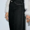 Jeans a gamba dritta con borchie