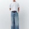 Jeans a gamba larga con stampa a stelle