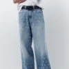Jeans a gamba larga con stampa a stelle