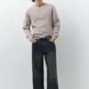 Jeans a gamba larga con vita a contrasto