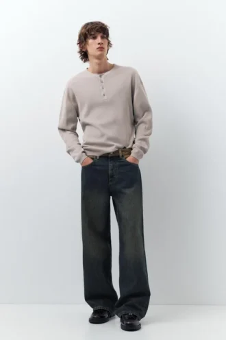 Jeans a gamba larga con vita a contrasto
