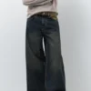 Jeans a gamba larga con vita a contrasto