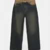 Jeans a gamba larga con vita a contrasto