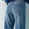 Jeans baggy a gamba dritta con strass Jeans baggy a gamba dritta con strass