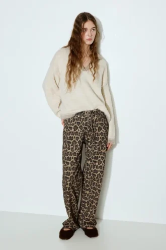 Jeans con stampa leopardata e coulisse