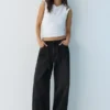 Jeans larghi con coulisse Jeans larghi con coulisse