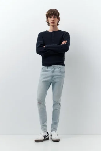 Jeans skinny strappati