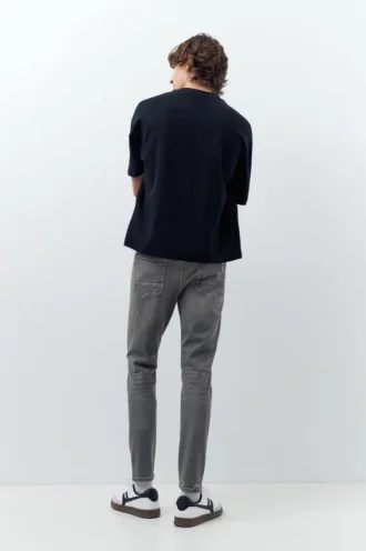 Jeans skinny strappati