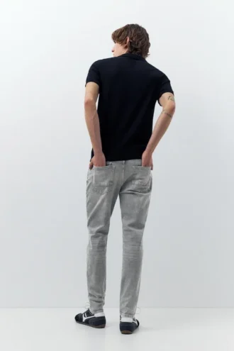 Jeans skinny strappati
