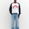 Jeans slim fit a zampa strappati Jeans slim fit a zampa strappati