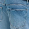 Jeans slim fit a zampa strappati Jeans slim fit a zampa strappati