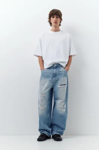 Jeans super baggy strappati