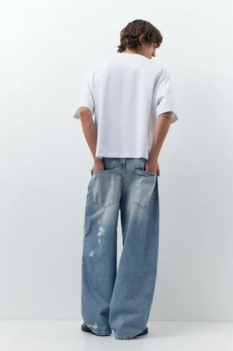 Jeans super baggy strappati