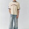 Maglione a maniche corte con stampa in stile pantaloncini