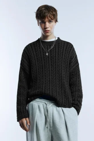 Maglione a trecce con lavaggio acid wash