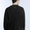Maglione a trecce con lavaggio acid wash