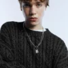 Maglione a trecce con lavaggio acid wash
