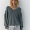Maglione con scollo a V Maglione con scollo a V