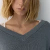 Maglione con scollo a V Maglione con scollo a V