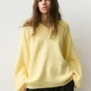 Maglione oversize con orlo asimmetrico Maglione oversize con orlo asimmetrico