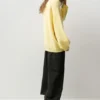 Maglione oversize con orlo asimmetrico Maglione oversize con orlo asimmetrico
