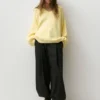 Maglione oversize con orlo asimmetrico Maglione oversize con orlo asimmetrico