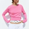 Maglione rosa con scollo a V Maglione rosa con scollo a V