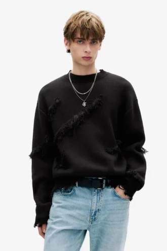 Maglione strappato con frange