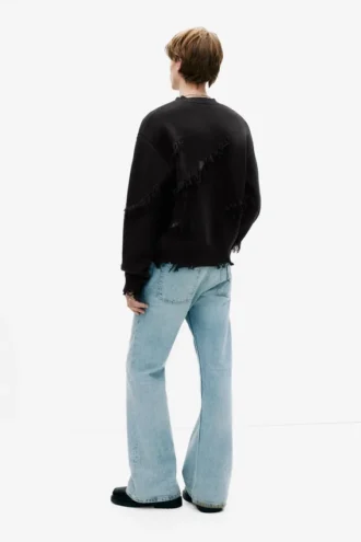 Maglione strappato con frange