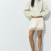 Pantaloncini a canotta con bordi in pizzo
