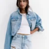 Pantaloncini in denim strappato Pantaloncini in denim strappato