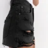 Pantaloncini in denim strappato Pantaloncini in denim strappato